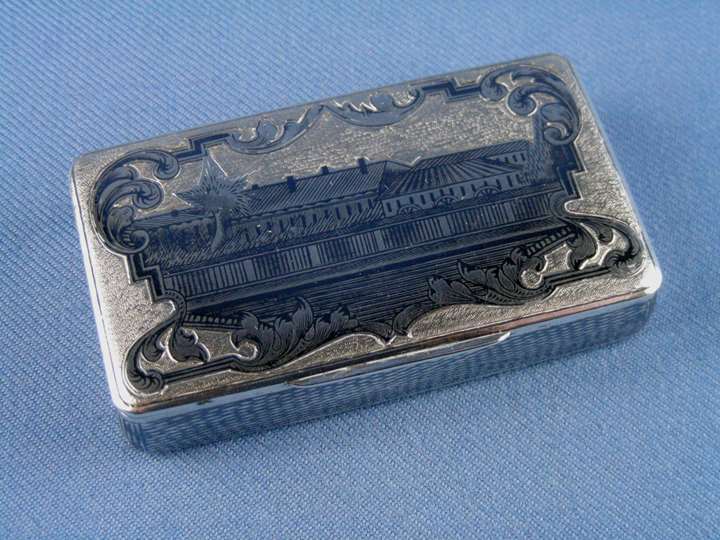 19th century Russian rectangular silver gilt niello box, depicting a row of houses, assaymaster Andrey Kovalskiy